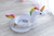 SALVAVIDAS INFLABLE DE UNICORNIO CON GLITTER 90 X 95 CM