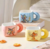 TAZA DE CERAMICA C/TAPA Y SORBETE TOM Y JERRY - comprar online