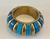 Pulseira Gomo G azul c/dourado