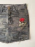Mini saia camuflada com patch tam. 40 - comprar online