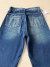 Calça Jeans Flare Cinturada tam. 36