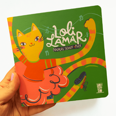 Libro infantil con ilustración de un gato amarillo con vestido rojo bailando sobre fondo verde