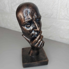 Escultura mão no rosto bronze