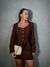 CONJUNTO DE CASAQUETO COM MINISSAIA - comprar online