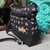 Bolsa feminina transversal pequena de tecido Basic mini floral preto - comprar online
