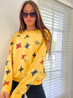 BUZO ENGOMADO ESTRELLAS ALMIRON AMARILLO