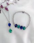 Conjunto Colar e Pulseira Prata com zircônias azuis e verdes