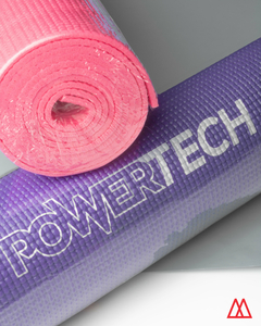 Colchonetas de yoga de la marca Power, una en color rosa y otra en color púrpura, enrolladas y apiladas.