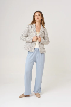 Pantalón de lino, tiro alto, con elástico en cintura y con bolsillo. en internet