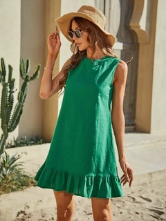 Imagen de Vestido de lino , con volado en terminación y tira en espalda .