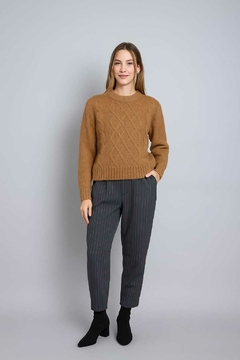Sweater tejido, tramado en rombos .