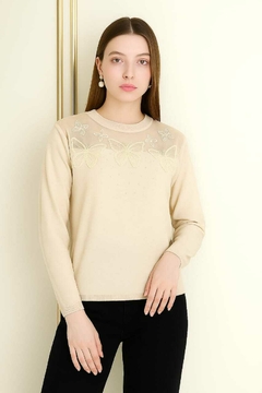 Sweaters de bremer liviano, con diferentes diseños de strass y calados. Importados. Calidad premium. - comprar online