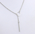 Collar Circulo atravesado por barrita - comprar online