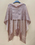 Imagen de Ponchos Paris Hilton