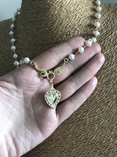 Collar corazón alas en internet