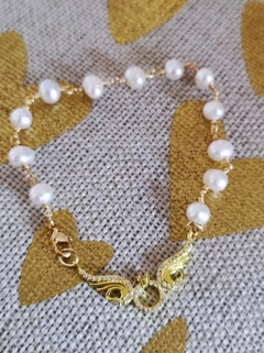 Pulsera alitas en internet