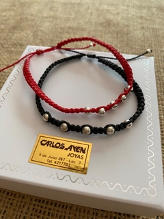Pulseras hilo y bolitas de plata