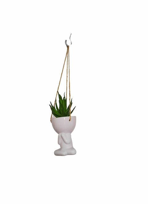 Arranjo com suculentas artificiais no vaso boneco bob