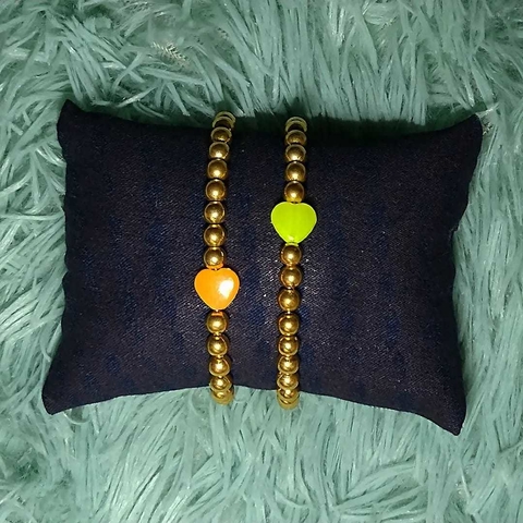 Pulseira dourada de coração - unidade