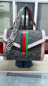 CARTERAS DE CUERO ITALIANO, ARGENTINO Y RAFIA, COLECCIÓN "BAMBOLAS ITALIANAS".