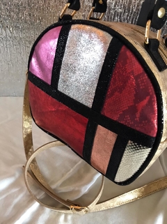 CARTERA DE CUERO DE OVEJA ITALIANA METALIZADA. "MONDRIAN DE QUEEN MARY". en internet
