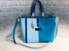 CARTERA DE TRES COLORES DE AZULES "AZZURRA" Y "BLUE".-
