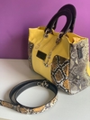Cartera de CUERO DE SERPIENTE ITALIANA COMBINADA CON CUERO CABRITILLA LISA.