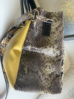 Cartera de CUERO DE SERPIENTE ITALIANA COMBINADA CON CUERO CABRITILLA LISA.