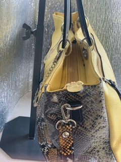 Cartera de CUERO DE SERPIENTE ITALIANA COMBINADA CON CUERO CABRITILLA LISA.