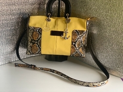 Cartera de CUERO DE SERPIENTE ITALIANA COMBINADA CON CUERO CABRITILLA LISA. en internet
