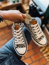 ZAPA CON PLATAFORMA DE LONA ANIMAL PRINT