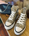 ZAPA BOTITA CON PLATAFORMA DE LONA ANIMAL PRINT