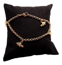 Pulsera laminada en oro 18k "amarillo" con dijes tortuga. - comprar online