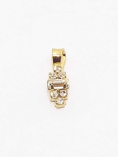 Dije con piedras Cristal laminado en oro 18k.