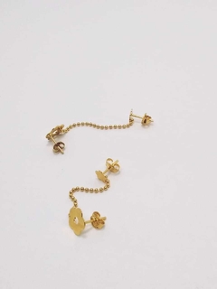 Aros flor doble perforado laminado en oro 18k- Romminox - comprar online