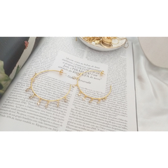 Brinco argola thifany com zircônias banhada a ouro 18k - comprar online