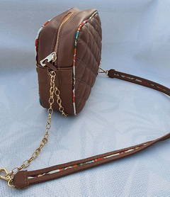 Bolsa tiracolo Ragazza com alças metal e couro na internet
