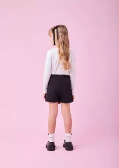 Conjunto com blusa bailarina e short saia em couro Preto - Tindolelê