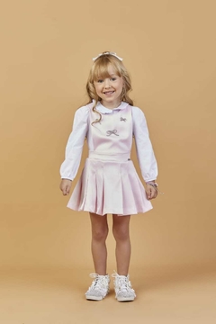 Conjunto salopete laçinhos com blusa