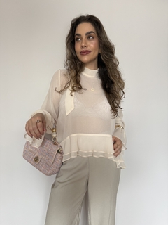 Bata em crepe babados Perla na internet