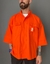 Camisa estruturada OVERSIZE laranja. na internet