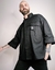 Camisa estruturada OVERSIZE preta.