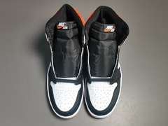 1 Retro High OG Eletrical Orange na internet