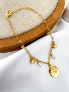 Pulseira folheada a ouro 18k e prata 925 com pingente "confio".