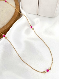Riviera folheada a ouro com miçangas pink