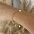 Pulseira com Mini Corações e Ponto de Luz Banhada com Ouro 18k