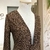 Cardigan alongado animal print fio metalizado