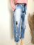 Calça jeans skinny destroyed; cinta alta - NINA MELANINA BRECHÓ