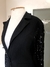 Blazer preto com mangas em renda na internet