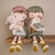 Cuddle doll Farmer Rosa with sheep 35cm - comprar online